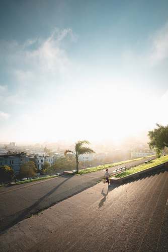 san francisco person running towards stairs during sunrise united states